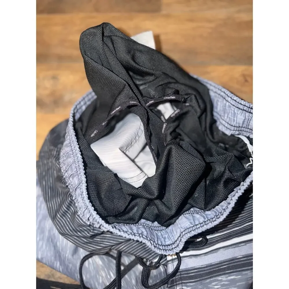 Calvin Klein men’s grey& black swim trunks